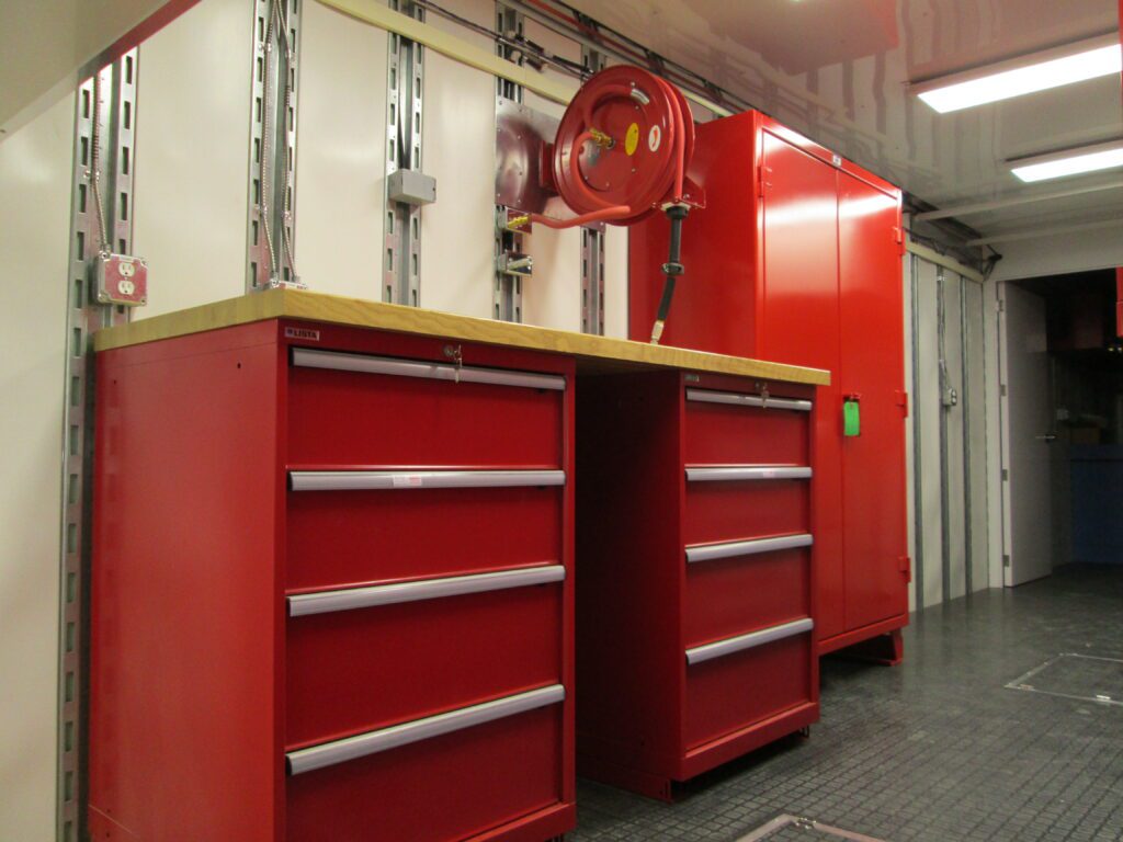 red cabinet in workshop trailer