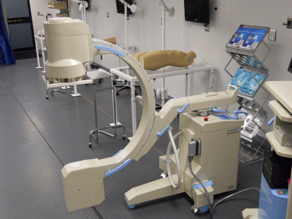interior of light blue large mobile clinic treatment trailer
